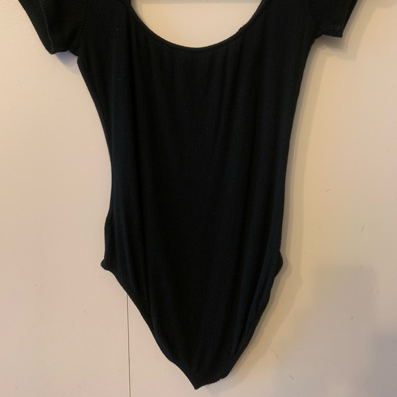 Out from under body suit - Picture 3 of 4